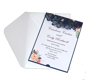 Laser cut rose wedding invitation set with navy blue cover and floral inner card