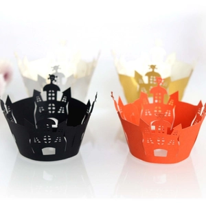 Laser cut Halloween cupcake wrappers featuring castle and skull motifs in four colors