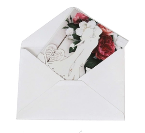 European laser cut white wedding invitation with floral rose and kissing couple silhouette
