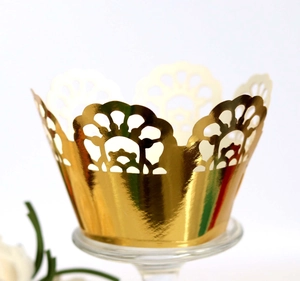 Elegant laser-cut golden cupcake wrapper with crown edge design for wedding party decor