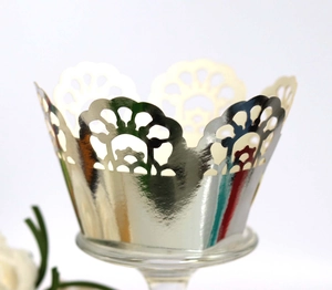 Elegant gold laser-cut lace cupcake wrappers for wedding dessert table decoration