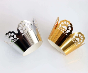 Elegant gold and silver crown laser-cut cupcake liners for party table decorations