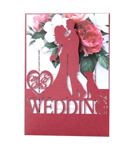 Intricate laser-cut burgundy wedding invitation with Mr & Mrs silhouette detail