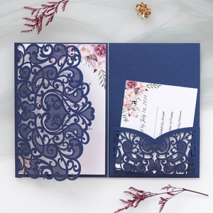Detailed laser cut navy blue wedding invitation set with floral inner card and RSVP card