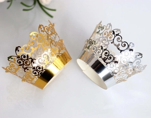 Laser cut hollow cupcake liners in gold and silver with elegant lace pattern decor