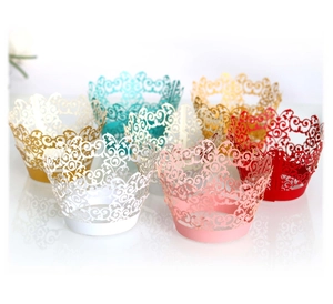 European laser cut hollow cupcake wrappers in multiple colors with crown lace design