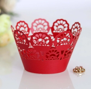 Red laser-cut lace paper cake wrappers with elegant floral hollow patterns for weddings