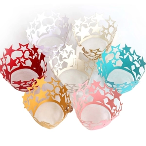 Laser cut star hollow cupcake wrappers in multiple vibrant colors for party decorations