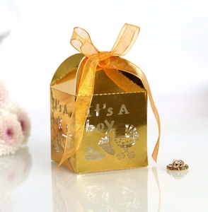 Golden Boy laser-cut candy box with It's A boy text, stroller patterns and yellow ribbon