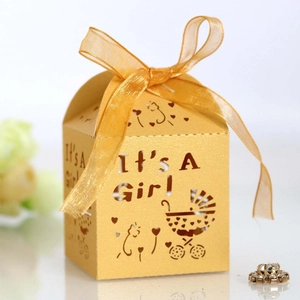 Golden laser-cut baby shower gift box featuring It's A Girl text and stroller pattern