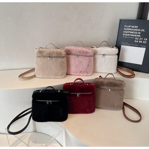 Collection of plush faux fur backpacks in six colors with dual zippers and leather straps