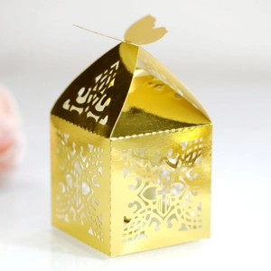 Golden laser cut cross favor box with butterfly closure for weddings and parties