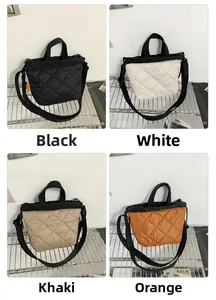 Puffy quilted tote bags in black, white, khaki, and orange with adjustable straps