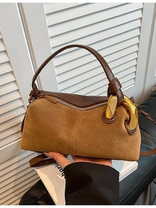 Vintage suede and leather patchwork crossbody bag with gold hardware in brown