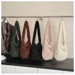 Detailed set of five plush fleece shoulder bags in olive, brown, black, pink, and beige