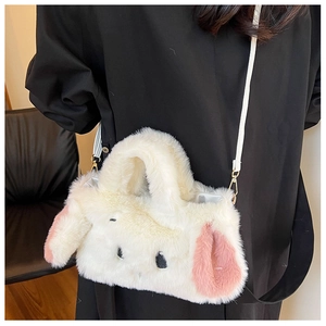 Detail of cute plush dog-shaped crossbody bag featuring soft faux fur and metallic hooks