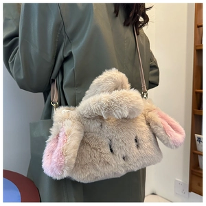 Fluffy rabbit plush crossbody bag with long ears shown as a stylish shoulder bag wear
