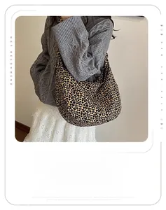 Detailed close-up showing stylish leopard print pattern and soft texture on tote bag