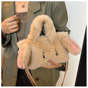 Detail of plush bunny handbag showing long ears and premium faux fur texture on coat