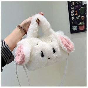 Detailed macro view of soft white plush bunny bag showing faux fur texture and pink inner ears