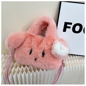 Close-up of pink faux fur rabbit handbag with animal embroidery and pompom charm