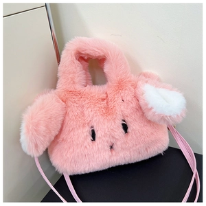 Detail of pink plush rabbit bag showing soft faux fur texture and cute stitched facial features
