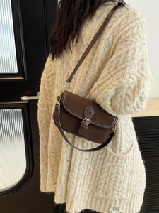 Vintage dark brown faux leather square shoulder bag with flap and metal buckle detail