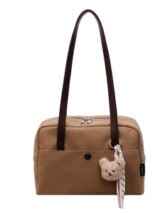 Brown canvas tote bag with shoulder straps, front button pocket and bear keychain