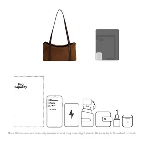 Large dark brown suede pillow bag showing capacity for phone, umbrella and daily essentials