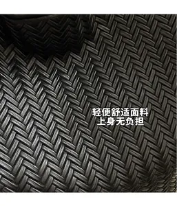 Détail macro de la texture tissée noire de haute qualité d'un grand sac cabas
