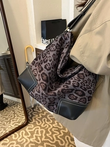 Retro leopard print tote bag with black leather patchwork and contrast white stitching
