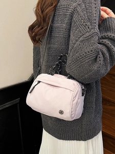 Chic pink and purple nylon tote bag with braided handles and adjustable shoulder strap