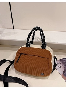 Corduroy patchwork handbag in beige and caramel brown with woven handles and shoulder strap