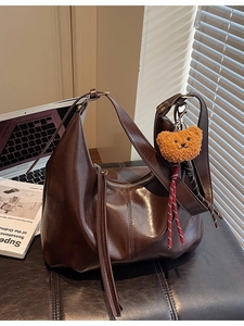 Vintage large dark brown shoulder bag in glossy PU leather with a cute bear charm
