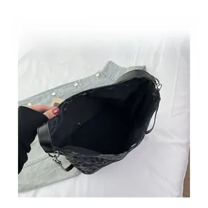 Top view of leopard print tote bag interior showing large capacity and black lining