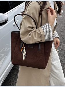 Minimalist dark coffee suede underarm tote bag with colorful wooden beads and long straps