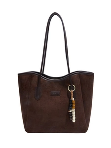 Minimalist dark brown suede underarm tote bag with stylish colorful beaded charm