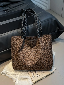 Vintage leopard print tote bag with woven black handles and large capacity design