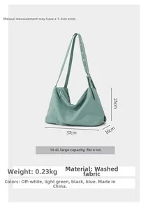 Detail view of a 14.6L capacity light green washed fabric tote bag with dimensions
