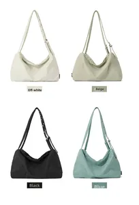 Detailed view of four shoulder bags in beige, green, black, and blue with adjustable straps