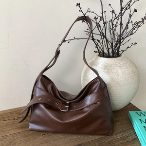 Vintage brown PU leather tote bag with adjustable shoulder strap and metal buckle