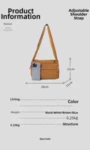 Brown nylon crossbody bag showing 26x21x11cm dimensions and adjustable shoulder strap