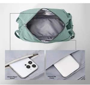 Detailed interior of green nylon tote bag featuring zip pocket and inner compartments