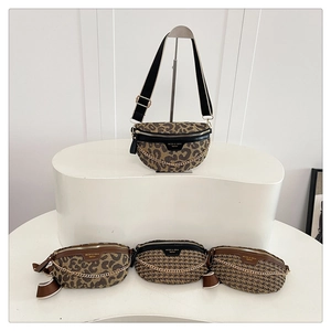 Detail of crossbody bags with leopard prints, houndstooth patterns and wide straps