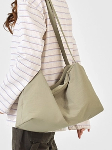 Fashionable sage green pleated tote bag with wide strap for casual daily use