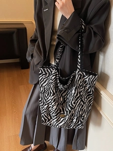Chic zebra pattern tote bag with large capacity and dual shoulder straps for daily use