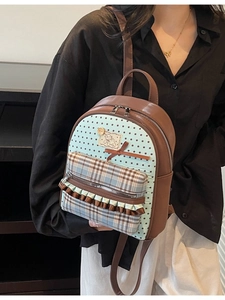 Cute bowknot women's small backpack with star patterns and checkered pocket detail