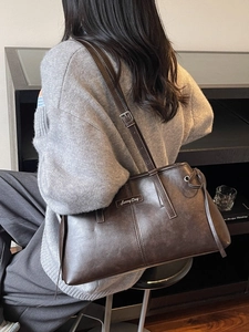 Vintage dark brown matte leather shoulder bag for women with minimalist pillow bag design