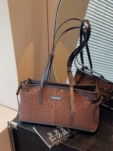 Vintage leopard print shoulder bag in brown faux suede with adjustable leather strap