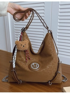 Brown leopard print large tote bag with M logo, plush bear charm and adjustable strap